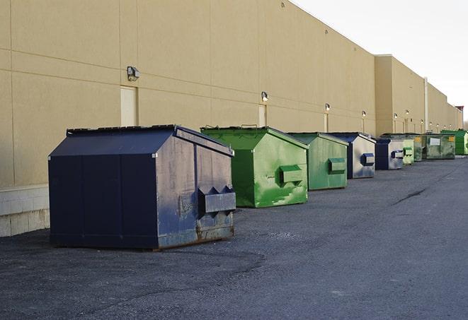 a pile of rugged and heavy-duty dump containers ready for construction waste in Alameda CA