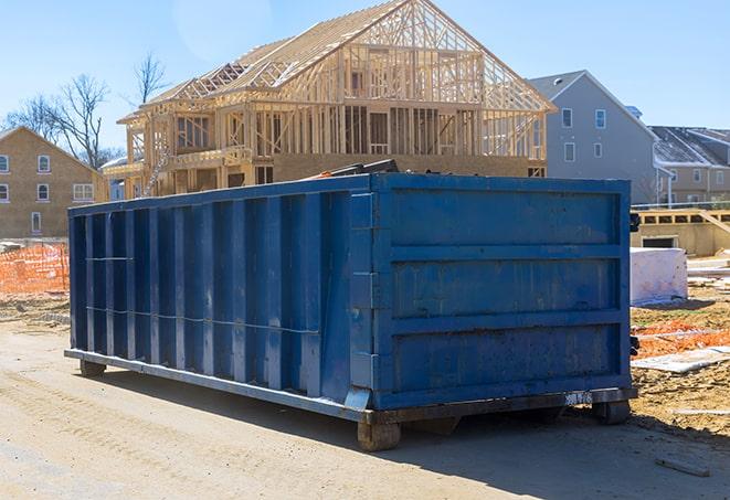 a series of trash compactors used for weekly curbside collection